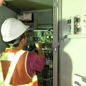Electrician is changing wire of the VSD in tunnel.